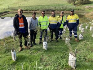 At the Thomson Brook project site, Keipa Boodja Director Murray Collard joined the Danju – Jobs Together team of Laurie Winmar, Shannan Turvey, Peter Jetta, Scott Bazeley and Boston Turvey beside revegetation established in June 2025.